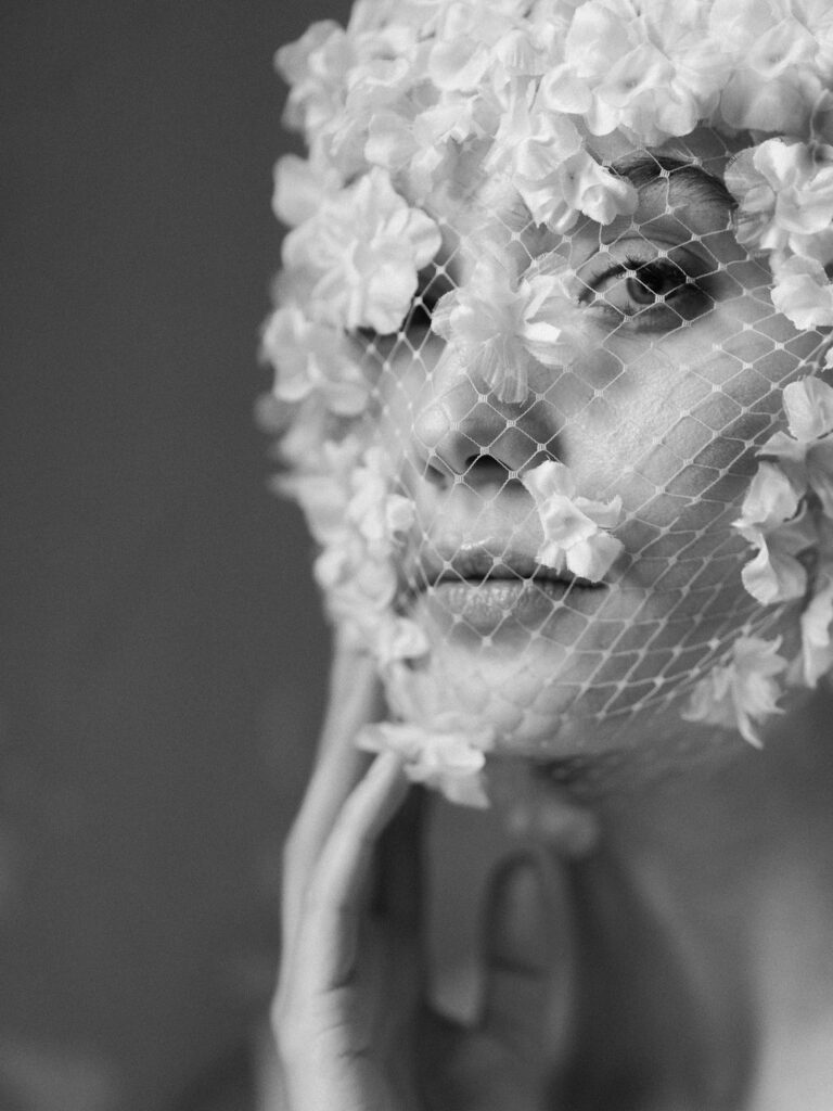 close up of headpiece over bride's face