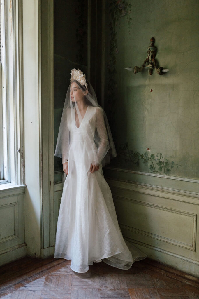 bride wearing her wedding dress in green room mansion